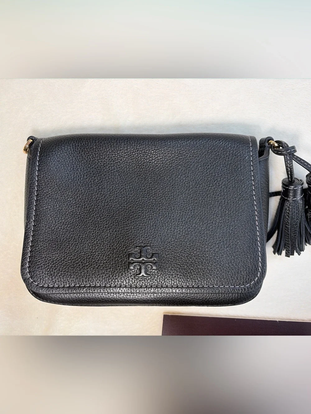 Tory Burch Thea Flap Black Pebbled Leather‎ Crossbody with Tassel and Wide Strap